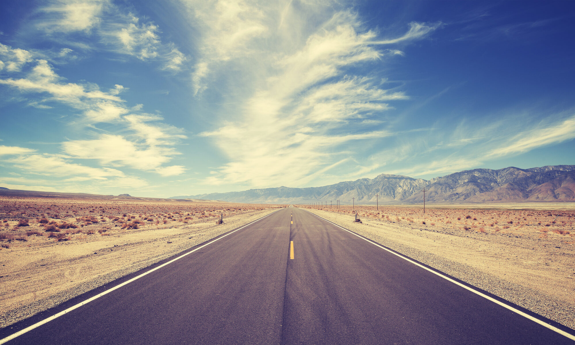 Vintage style country highway in USA, travel adventure concept.